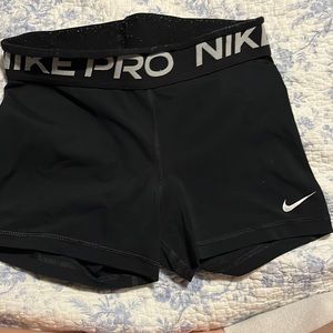 Small black nike pros 3’